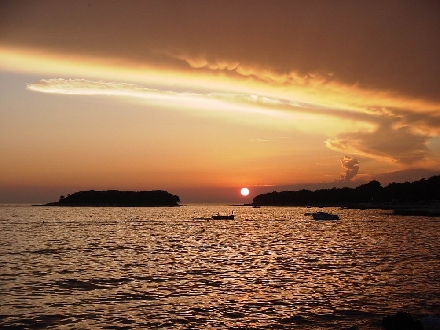 FUNTANA > Strandblick > Sonnenuntergang