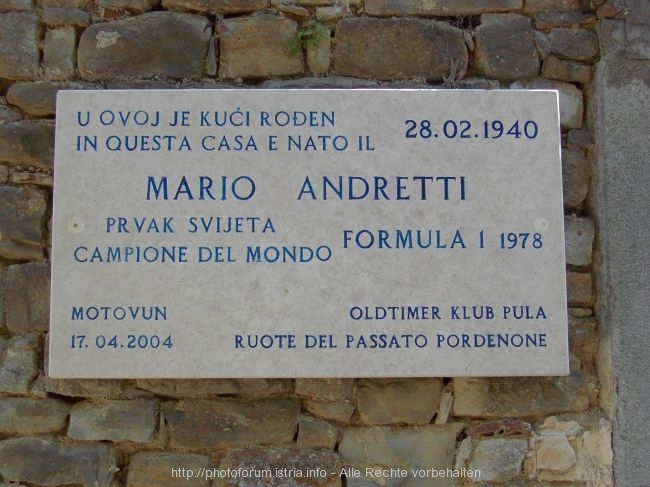 MOTOVUN > Hauswand > Gedenktafel Mario Andretti