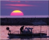 SONNE > Fischerboot im Sonnenuntergang